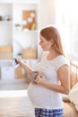 Pregnant Woman looking at Ultrasound Picture Royalty Free Stock Photo