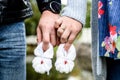 Pregnant woman and loving husband holding baby`s bootees Royalty Free Stock Photo