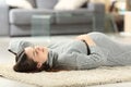 Pregnant woman lying on the floor at home Royalty Free Stock Photo