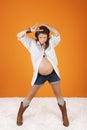 Pregnant Woman Makes Bull Horn Sign