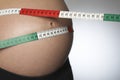 Pregnant Woman Measuring Belly With Tape Measure Royalty Free Stock Photo