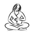 Pregnant woman meditating while sitting in lotus position. Yoga