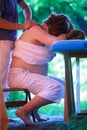 Pregnant woman neck massage by physical therapist