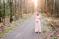 Pregnant woman outdoors relaxing in forest Royalty Free Stock Photo