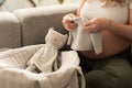 Pregnant woman packing maternity bag Royalty Free Stock Photo