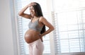 Pregnant woman in pain during exercise Royalty Free Stock Photo
