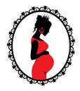 Pregnant woman in a patterned frame Royalty Free Stock Photo