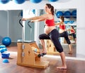 Pregnant woman pilates exercise wunda chair Royalty Free Stock Photo