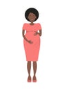 Pregnant woman in a pink dress. Cute black woman holds her hands on her stomach Royalty Free Stock Photo