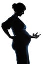 Pregnant woman portrait holding baby bottle Royalty Free Stock Photo