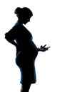 Pregnant woman portrait holding baby bottle silhouette Royalty Free Stock Photo