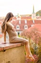 Pregnant woman in Prague park with red roof view in autumn, Prague, Czech Republic Royalty Free Stock Photo