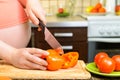 Pregnant woman preparing a healthy meal Royalty Free Stock Photo