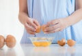 Pregnant woman preparing meal at table Royalty Free Stock Photo