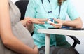 Pregnant woman during pulse measurement Royalty Free Stock Photo