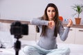 The pregnant woman recording video for her blog Royalty Free Stock Photo