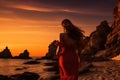 Pregnant woman in red dress standing on the beach at sunset, Epic red sunset in Cala Llentrisca with a model, Ibiza, AI Generated