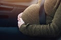 Pregnant woman with seat belt