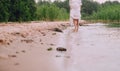 Pregnant woman shore river sand water Royalty Free Stock Photo