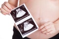 Pregnant woman show image ultrasound on white background