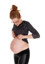 Pregnant woman showing bally. Royalty Free Stock Photo