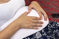 Pregnant woman showing heart by hands Royalty Free Stock Photo