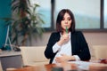 Pregnant Woman Signing Maternity Leave Papers at Work