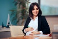 Pregnant Woman Signing Maternity Leave Papers at Work