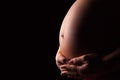 Pregnant woman silhouette over black background Royalty Free Stock Photo