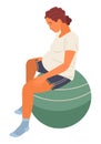 Pregnant woman sits on fitness ball with head bowed. Relaxation exercises for pregnant women