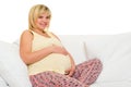 Pregnant woman on sofa