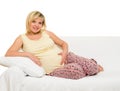 Pregnant woman on sofa