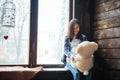 Pregnant woman with soft bear