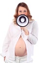 Pregnant woman speaks into megaphone Royalty Free Stock Photo