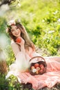 A pregnant woman in a spring garden with basket Royalty Free Stock Photo