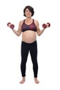 Pregnant woman standing doing exercise