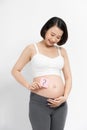 Pregnant woman with stick notes on her belly Royalty Free Stock Photo