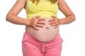 Pregnant woman with stomach ache - heartburn concept