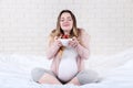 Pregnant woman with strawberries Royalty Free Stock Photo