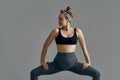 Pregnant Woman Stretching Arms And Legs, Doing Prenatal Workout At Home On Yoga Mat. Selective focus Royalty Free Stock Photo