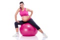 Pregnant woman stretching legs Royalty Free Stock Photo