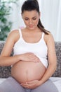 Pregnant woman stroking her tummy Royalty Free Stock Photo