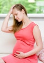 Pregnant woman with strong pain of stomach