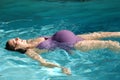 Pregnant woman swimming