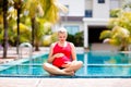 Pregnant woman in swimming pool. Healthy pregnancy Royalty Free Stock Photo