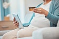 Pregnant woman, tablet and credit card for ecommerce, online shopping and payment on internet store on home sofa. Female Royalty Free Stock Photo