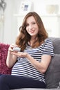 Pregnant Woman Taking Folic Acid Tablets Royalty Free Stock Photo