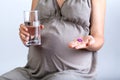 Pregnant woman taking medicines Royalty Free Stock Photo