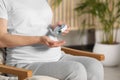 Pregnant woman taking pills at home, closeup. Space for text Royalty Free Stock Photo