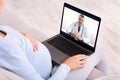 Pregnant Woman Talking With Doctor Via Video Call At Home Royalty Free Stock Photo